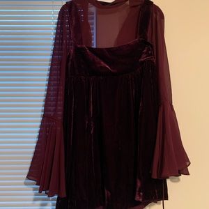 velvet mini dress with sheer bell sleeves